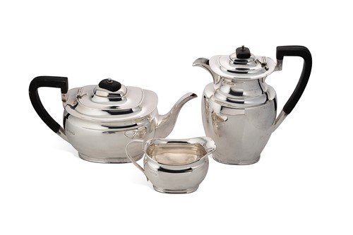 Lot 405 - A George V silver three piece tea set