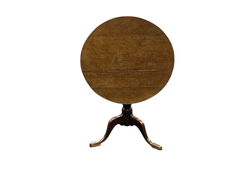Lot 620 - A provincial oak tilt top pedestal table, 19th...