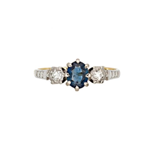 Lot 164 - A sapphire and diamond three stone ring