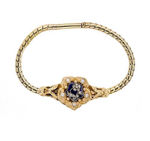 Lot 104 - A diamond, pearl and enamel bracelet