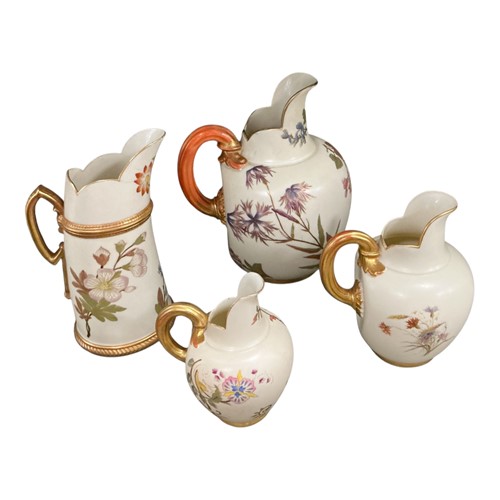 Lot 10 - Four Royal Worcester blush ivory jugs