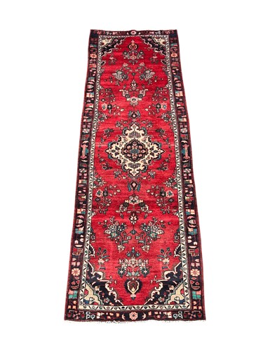 Lot 792 - A Hamadan runner with central medallion on a...