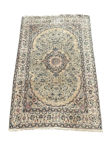 Lot 794 - Nain wool rug, blue and red scrolling foliate...