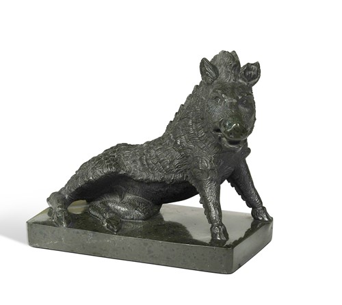 Lot 372 - After the Antique, a carved serpentine marble model of the Uffizi boar