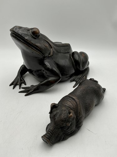 Lot 121 - A patinated bronze model of a pig, 20th century
