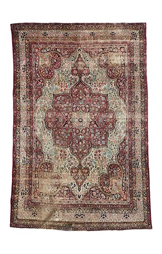 Lot 427 - A Kerman Lavar carpet, circa 1930