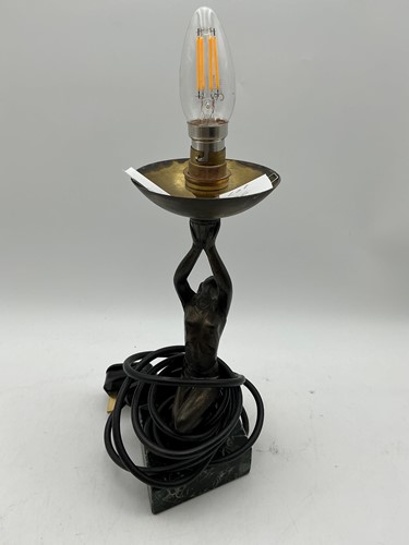 Lot 136 - An Art Deco bronzed spelter figural table lamp...