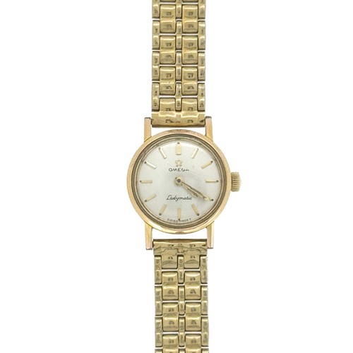 Lot 97 - Omega - A Ladymatic gold plated wristwatch,...