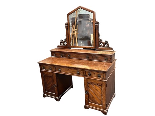 Lot 621 - An Arts & Crafts oak dressing table, late 19th...