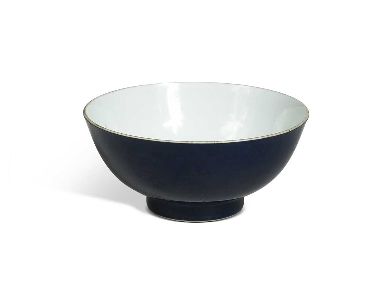 Lot 16 - A Chinese blue monochrome bowl, mark of Xuande and possibly of the Period