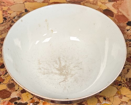 Lot 16 - A Chinese blue monochrome bowl, mark of Xuande and possibly of the Period