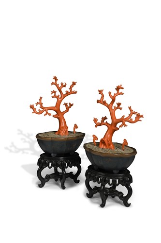 Lot 22 - A pair of Chinese lacquered wood and faux coral trees, 18th/19th century