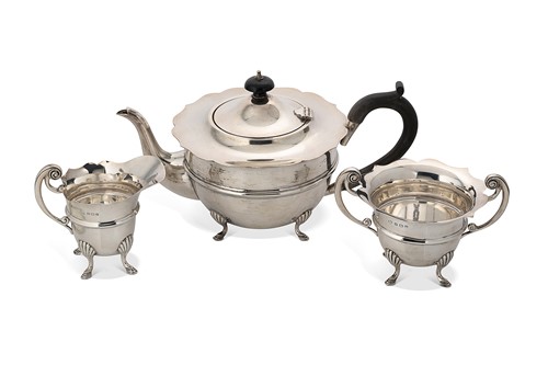 Lot 375 - A silver three piece teaset
