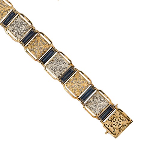 Lot 103 - An early 20th century synthetic sapphire articulated panel bracelet