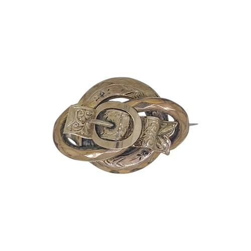 Lot 71 - A Victorian buckle brooch, tested as 9ct gold...