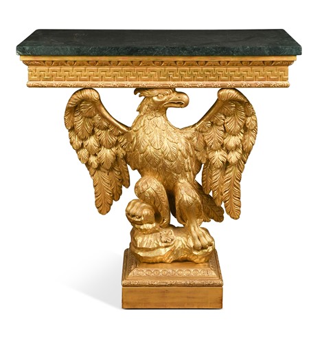 Lot 493 - A George II style carved and gilded eagle console table