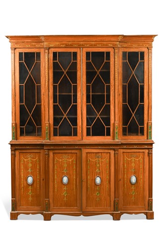 Lot 458 - An Edwardian Sheraton revival satinwood breakfront bookcase