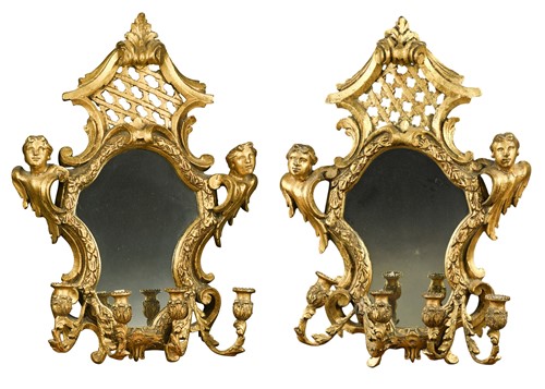 Lot 505 - A pair of carved giltwood wall appliqués, late 19th century