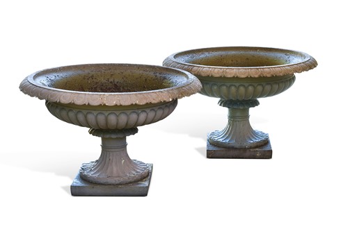 Lot 733 - A pair of Victorian circular cast iron garden urns