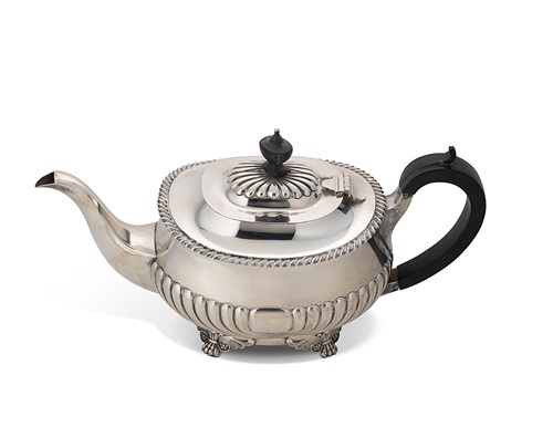 Lot 374 - Elkington & Co. - An Edward VII Regency style silver teapot