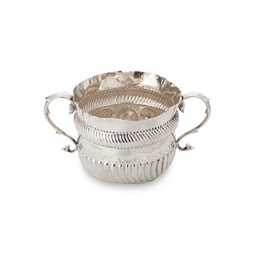 Lot 311 - An Edwardian silver porringer