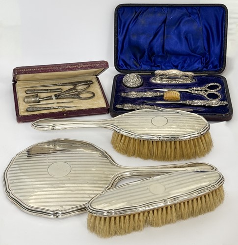 Lot 307 - A silver-mounted dressing table set,...