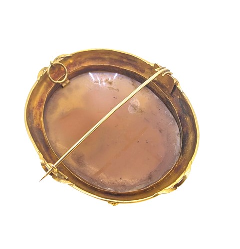 Lot 12 - A late Victorian 'night and day' shell cameo brooch