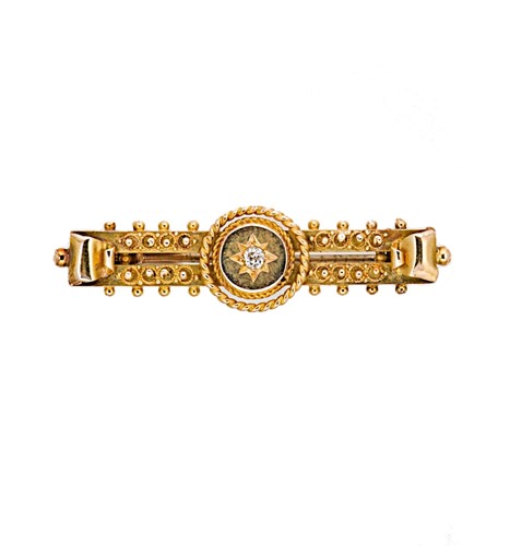 Lot 49 - An Edwardian 15ct gold diamond set bar brooch