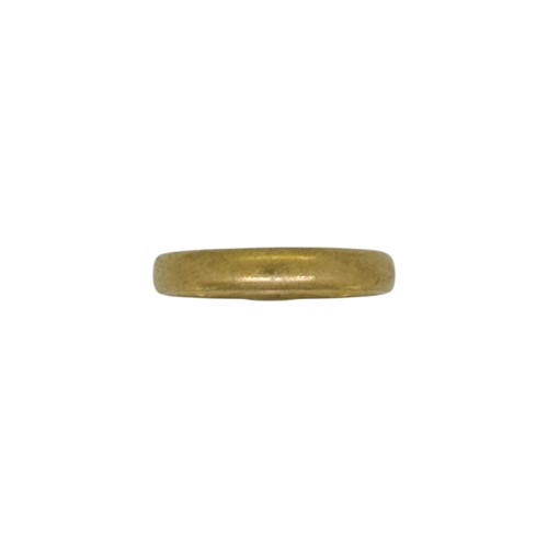 Lot 79 - A wedding band, hallmarked 22ct gold, size L,...