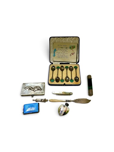 Lot 270 - A collection of silver including, a whistle...