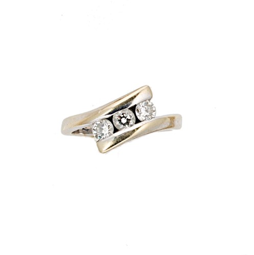 Lot 143 - A three stone diamond crossover ring