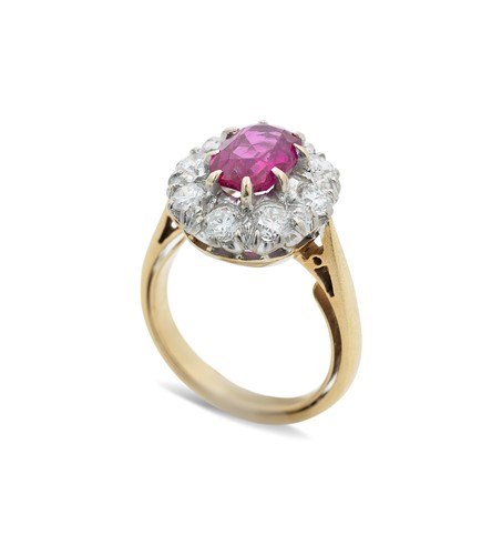 Lot 220 - A Burmese ruby and diamond cluster ring