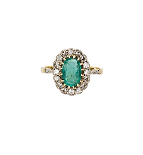 Lot 83 - An emerald and diamond cluster ring