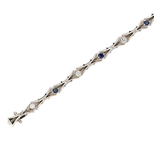 Lot 168 - An 18ct gold sapphire and diamond bracelet