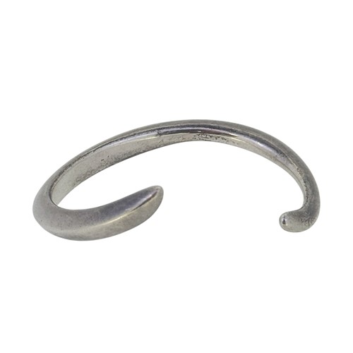 Lot 58 - Sarah Jordan - A silver bangle, inside...