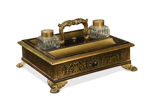 Lot 605 - A Regency brass-inlaid ebonised desk inkstand