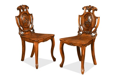 Lot 594 - A pair of Victorian hall chairs, probably laburnum