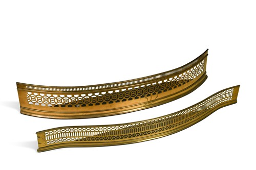 Lot 684 - Two curved brass fenders, 19th century