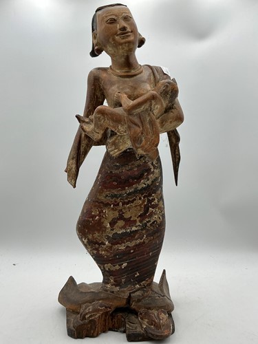 Lot 175 - A Chinese carved wooden figure of a mother and...