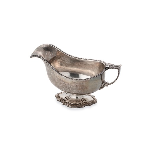 Lot 419 - A George V silver sauce boat