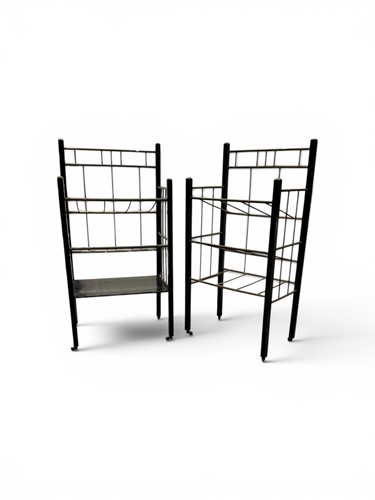 Lot 578 - A pair of 20th century ebonised wood and brass...