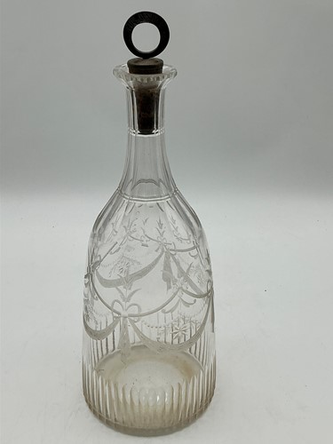 Lot 57 - A Regency glass decanter with cork stopper...