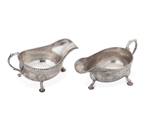 Lot 408 - A pair of George V silver sauce boats
