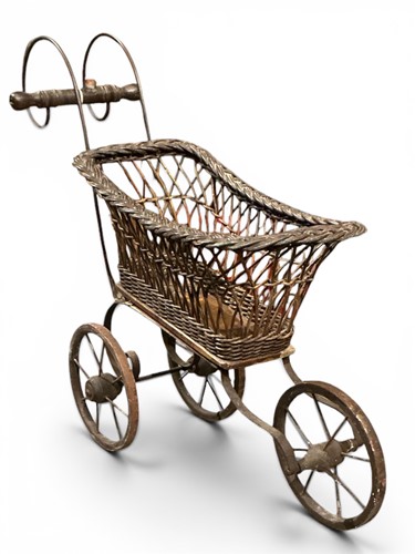 Lot 607 - A wicker doll's pram, 19th century, set on...