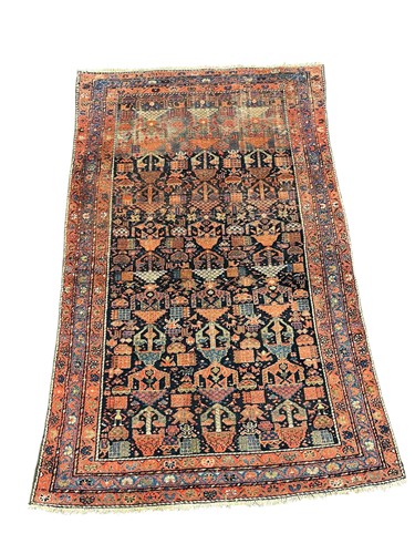 Lot 807 - A Hamadan rug, with overall design in indigo...