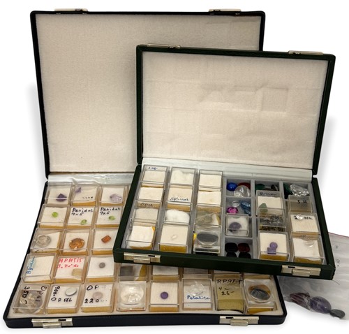 Lot 69 - Two boxes of loose gemstones, to include opal,...