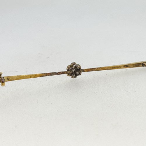 Lot 3 - An early 20th century diamond set daisy style...