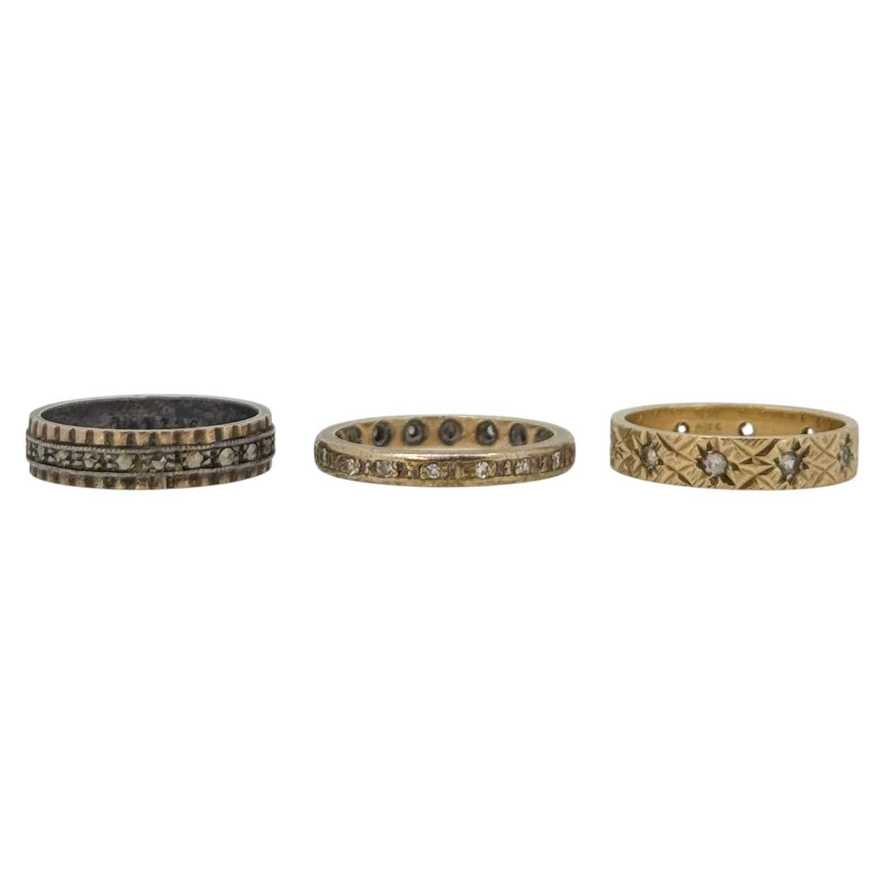 Lot 1 - A trio of stone set rings, to incude, a...