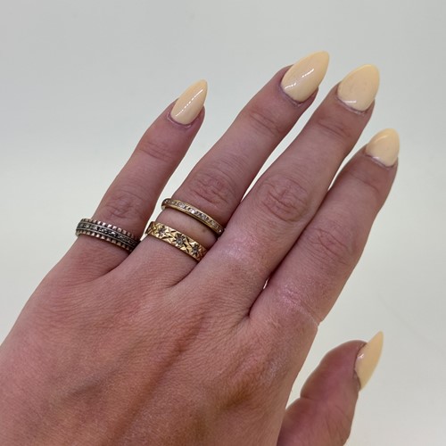 Lot 1 - A trio of stone set rings, to incude, a...
