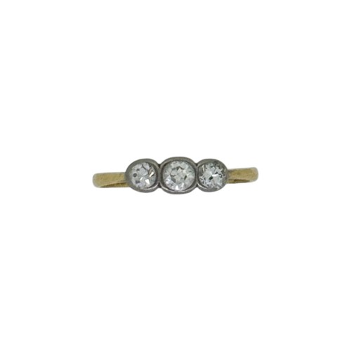Lot 4 - An early 20th century three stone diamond ring,...